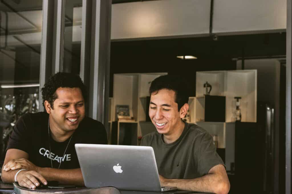 guys looking at a computer